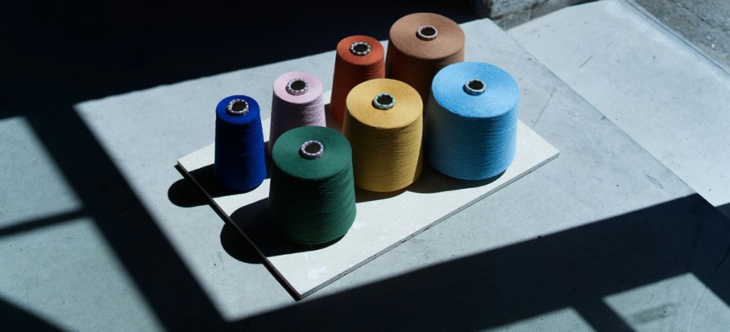 Open-end yarn cones — pink
